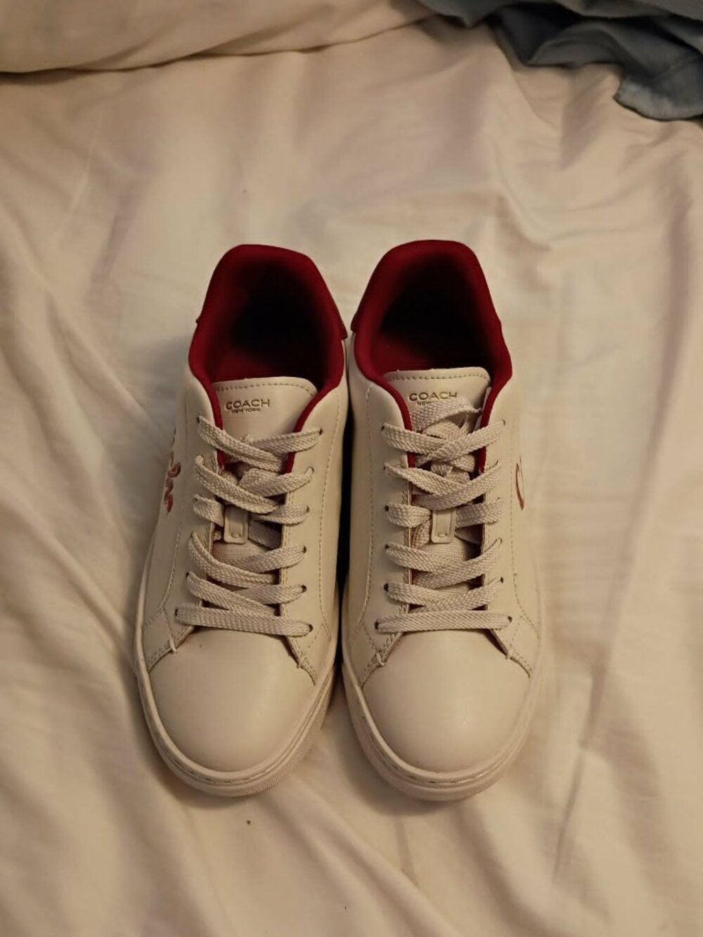 Coach Athletic Shoes, white leather trimmed in red with red Coach snake emblem